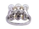 Anello in oro bianco a titolo 750/°°°  di grammi 6.60con delle perle e dei diamantini naturali 