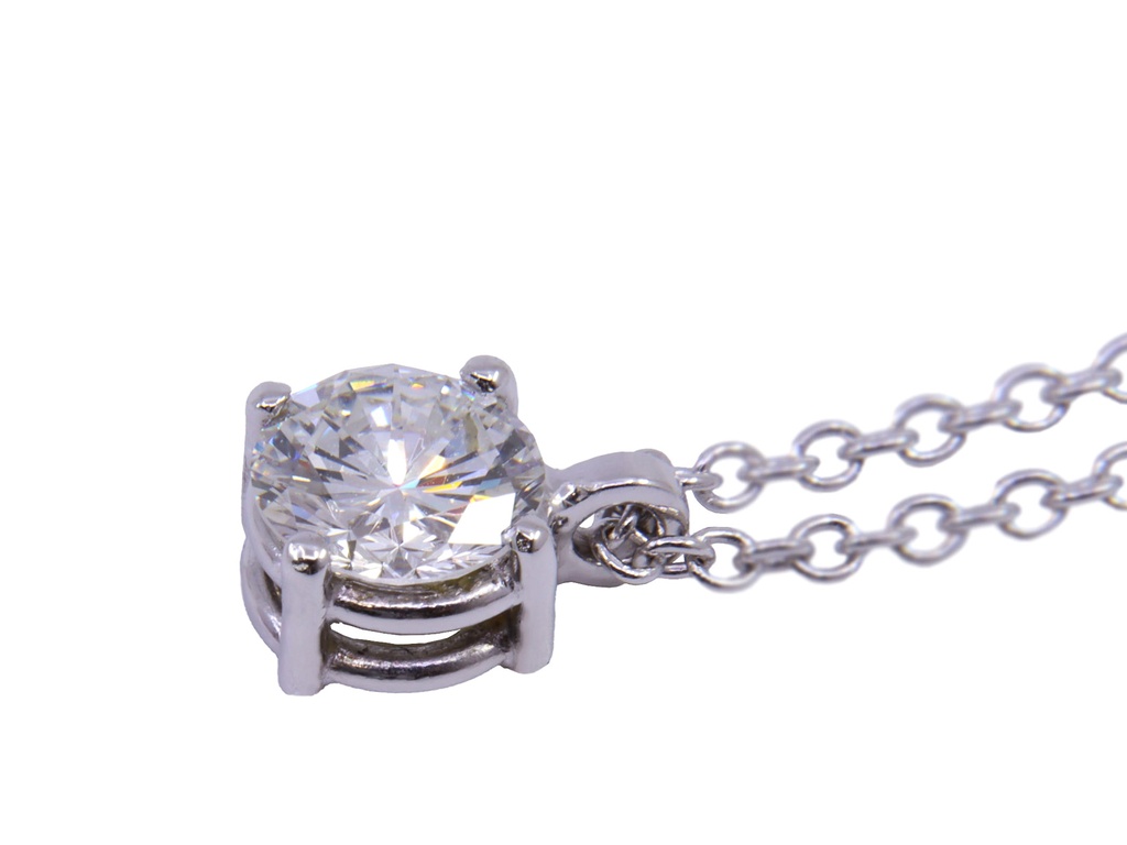 Collana modello punto luce in oro bianco a titolo 750/°°° di grammi2.60 con un diamante naturale di carati 0.45