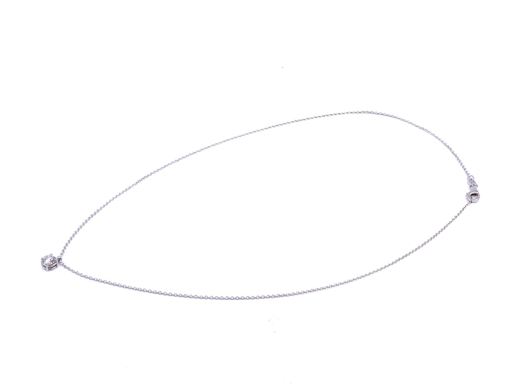 Collana modello punto luce in oro bianco a titolo 750/°°° di grammi2.60 con un diamante naturale di carati 0.45