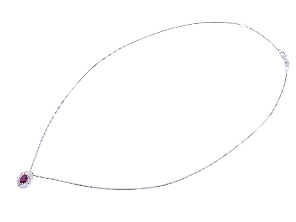 collino ob. Con rubino ovale centrale mozambico ct. 0.69 e brills attorno di ct. 0.30 fg vvs