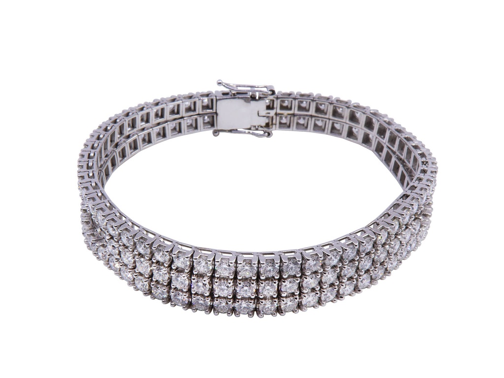Bracciale tennis in oro bianco 18 kt. e brillanti ct. 12.83 Colore F/G Grado di Purezza VVS - gr.32.70 Cm.18
