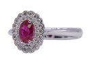 anello ob. Con rubino ovale centrale ct. 0.66 mozambico e brills attorno ct. 0.30 fg vvs