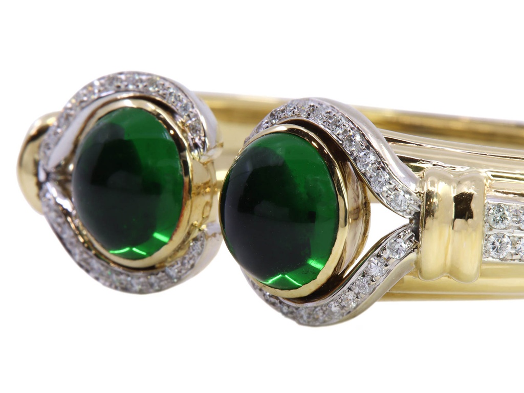 Bracciale rigido - Brillanti e pietre verdi, oro18kt. peso totale 58,5gr