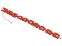 Bracciale in oro giallo a titolo 750/°°° (18 carati) con corallo dal peso complessivo di grammi 21.20