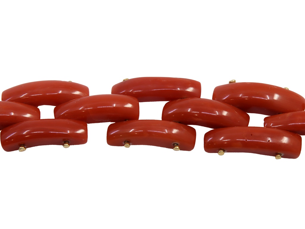 Bracciale in oro giallo a titolo 750/°°° (18 carati) con corallo dal peso complessivo di grammi 21.20