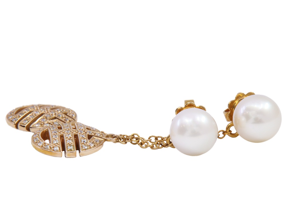 Orecchini 18kt Punzonati Mimi con piccoli diamanti  per gr. 9,9 gr. 9,9 ad euro 70,7 grammo