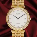 Van Cleef & Arpels, 18kt Yellow Gold, 34 mm, Quartz, Natural Diamonds Bezel and Dial, total weight 118 gr. Our Box & warranty