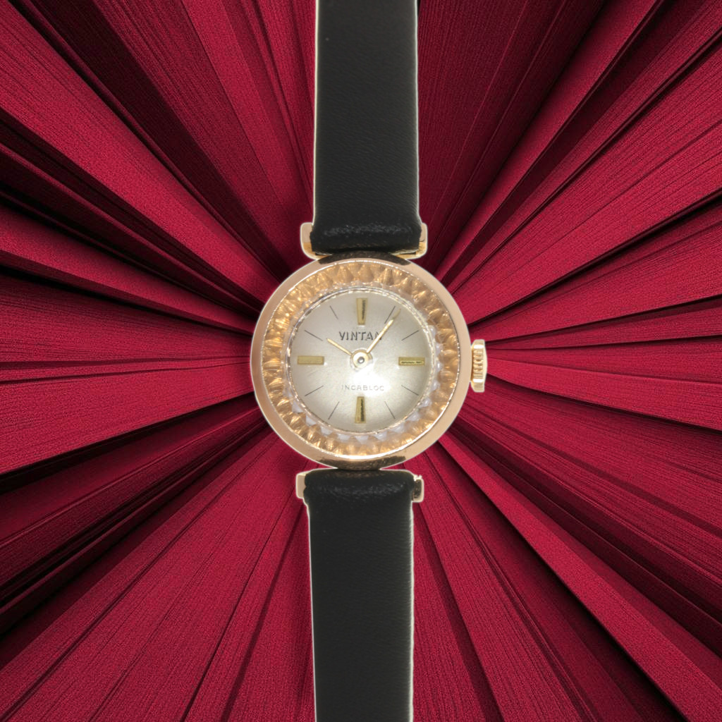 Vintan Lady 18 kt yellow gold (about 3g), zapphire cristal, manual winding - our box and warranty.