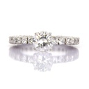 Anello solitario - Brillante centrale 1,26ct G-VVS2, brillanti a giro 1,30ct. F/G-VVS, oro 18kt.