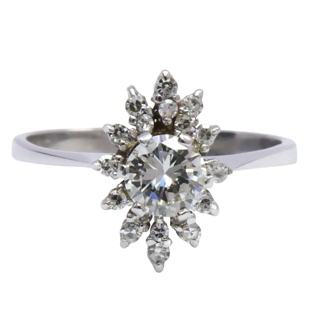 Anello - Brillante 0,53ct. + 0,15ct. I-VS1, oro 18kt di gr.3,2