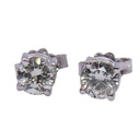 Orecchini mod. punto luce in oro bianco (18 kt)con due diamanti(0.34+0.37)