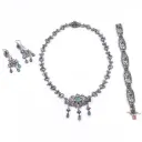 Parure stile antico: Brillanti taglio antico, smeraldi, oro bassa caratura e argento.