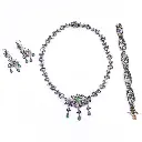 Parure stile antico: Brillanti taglio antico, smeraldi, oro bassa caratura e argento.