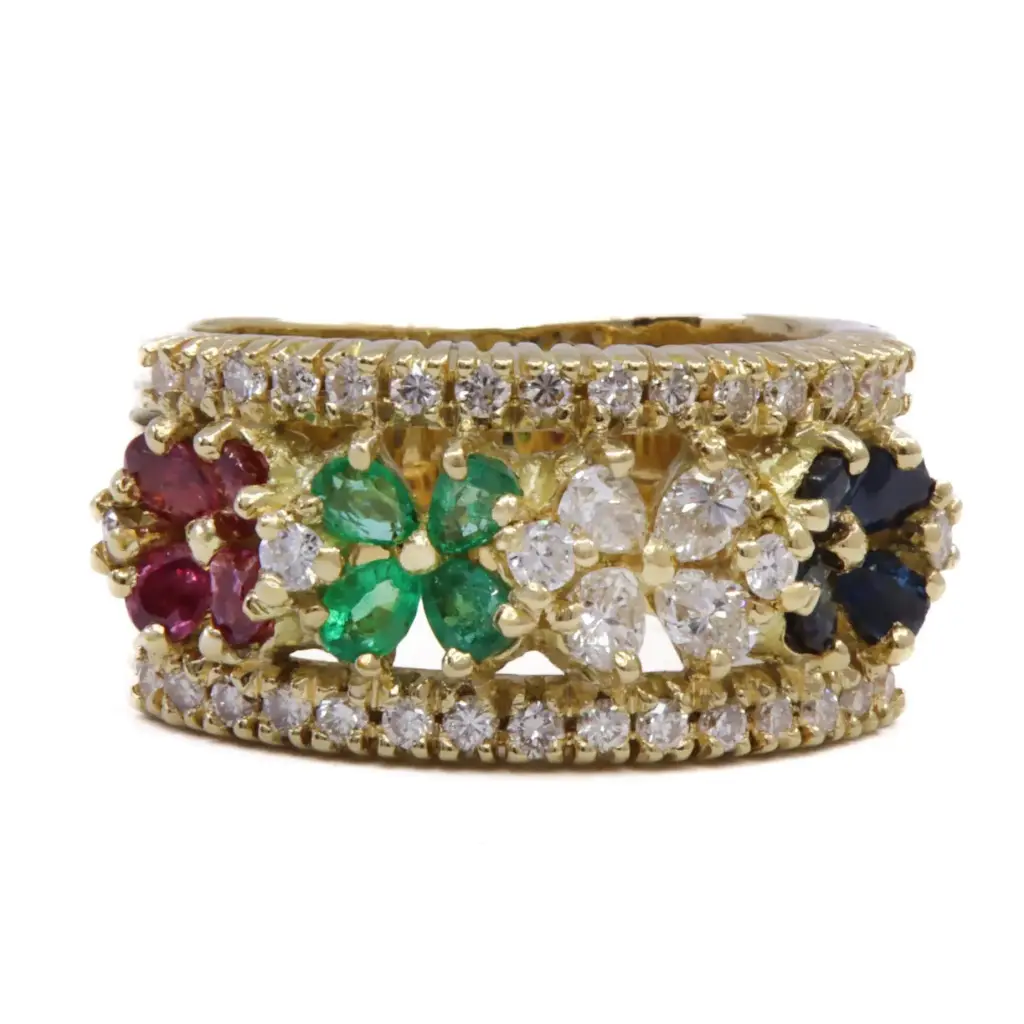 Anello fascia -  Brillanti, smeraldi, rubini e zaffiri. Oro 18kt. peso totale 12,10gr