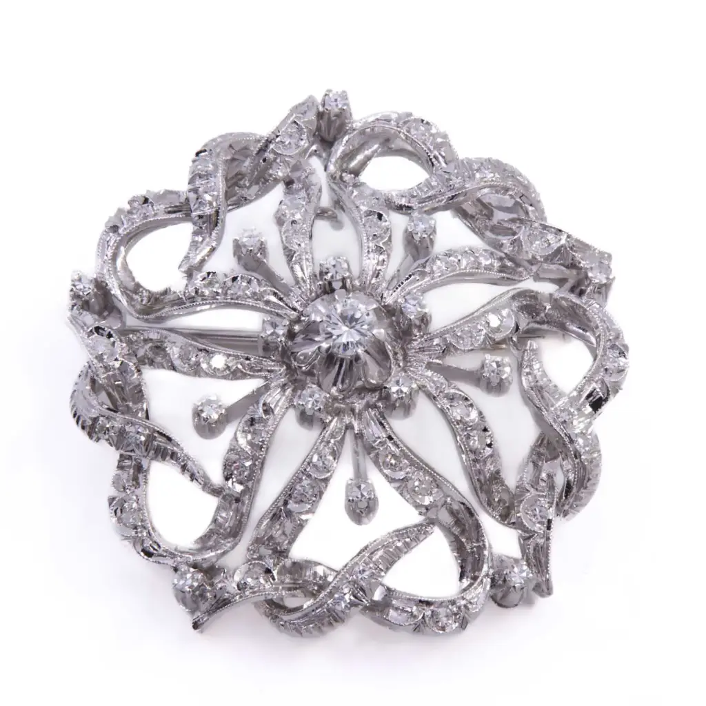 Spilla - Oro bianco18kt. diamanti 0,20+0,40ct. peso totale 14,10gr