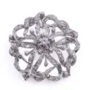 Spilla - Oro bianco18kt. diamanti 0,20+0,40ct. peso totale 14,10gr