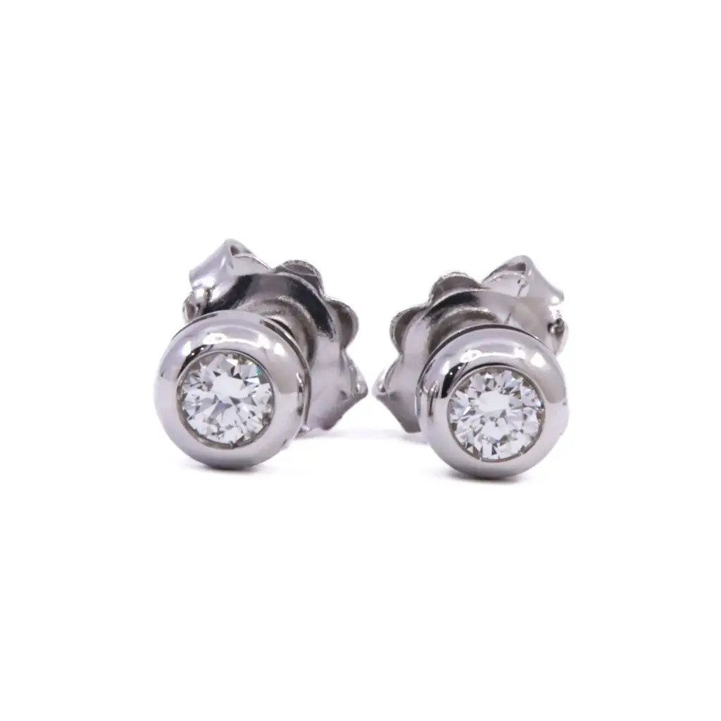 Orecchini puntoluce - Brillanti 0,18ct. totali, G-VS1 oro 18kt. peso totale 2,30gr