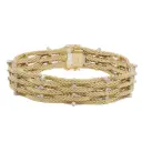Bracciale rigido intrecciato - Oro18kt. di gr. 60,20 con brillanti