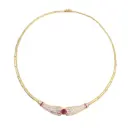 Girocollo: Brillanti 2,00ct. H-VS, Rubini 1,00ct.  peso totale 32,60gr. oro 18kt.