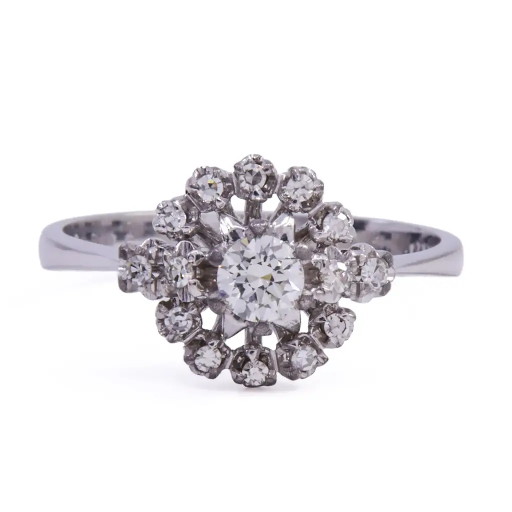 Anello solitario - Brillante 0,20ct + 0,14 J-VS oro 18kt, peso totale 3,60 gr